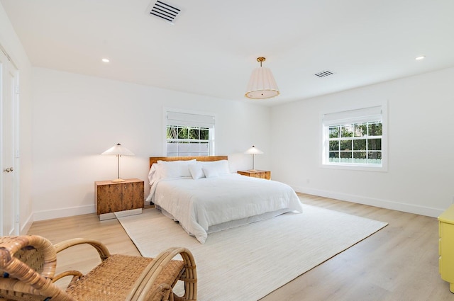 bedroom with light hardwood / wood-style flooring