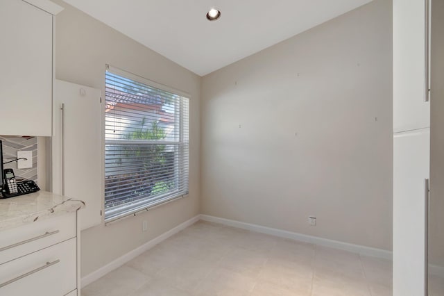 unfurnished dining area featuring a wealth of natural light