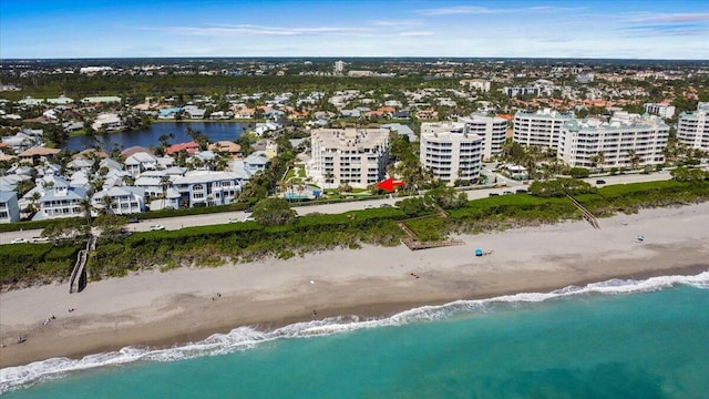 aerial view with a view of the beach and a water view