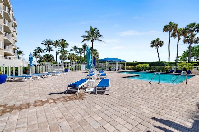 view of swimming pool featuring a patio