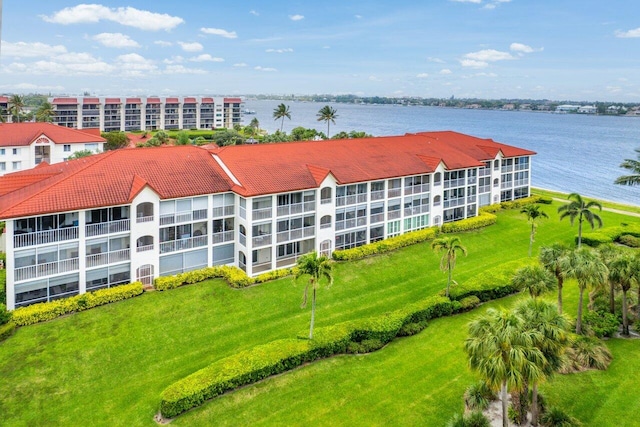 bird's eye view with a water view