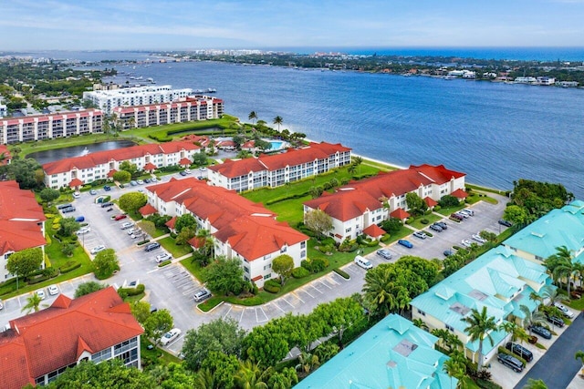 drone / aerial view with a water view