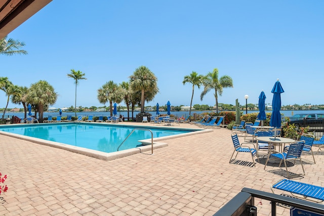 view of swimming pool featuring a patio area