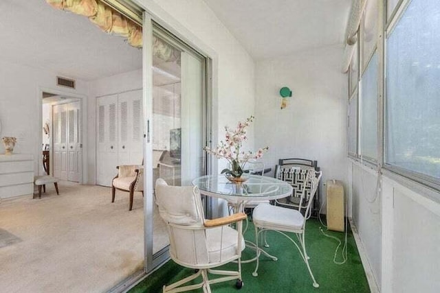 dining area with carpet floors