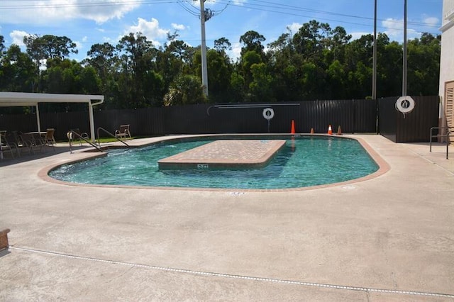 view of pool featuring a patio area