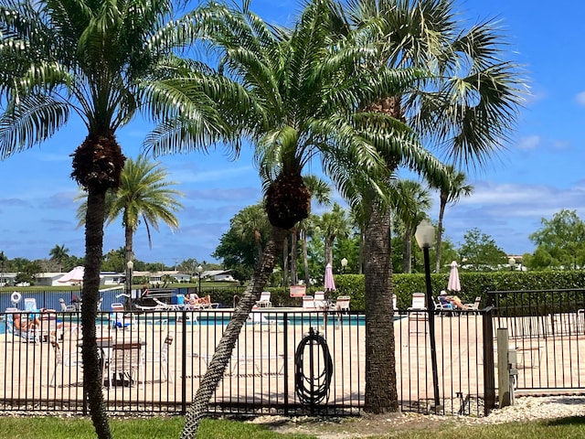 view of swimming pool with a patio area