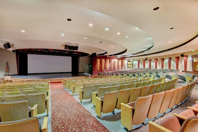 home theater room featuring a tray ceiling