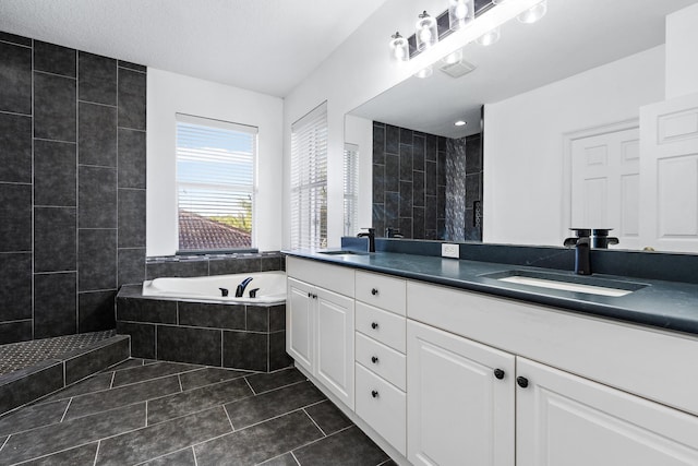 bathroom with vanity, plus walk in shower, and tile patterned floors