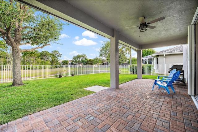 view of patio with ceiling fan