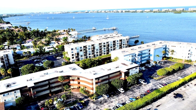 birds eye view of property featuring a water view