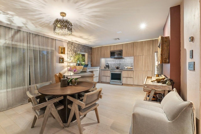 dining room with a chandelier