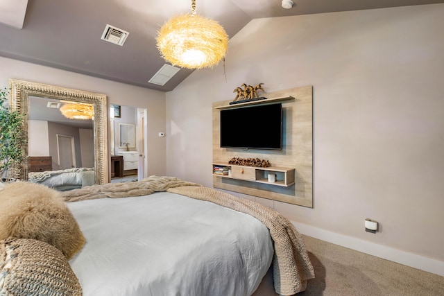 carpeted bedroom featuring lofted ceiling