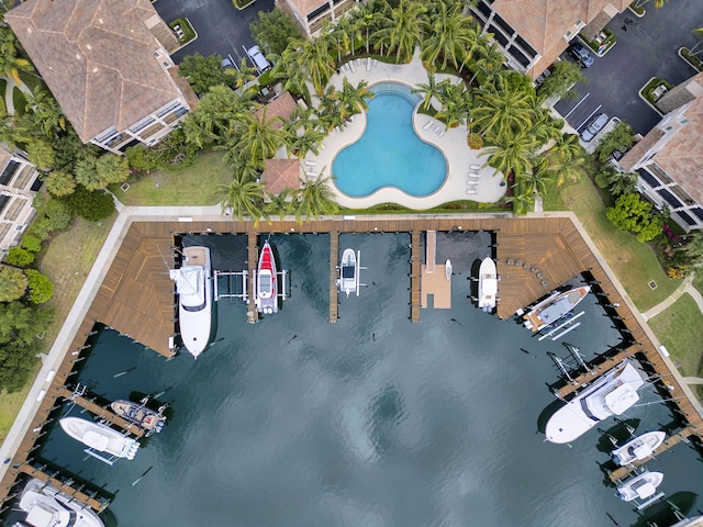 birds eye view of property featuring a water view