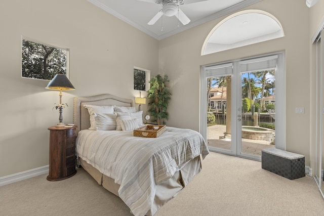 carpeted bedroom featuring ornamental molding, access to exterior, and ceiling fan