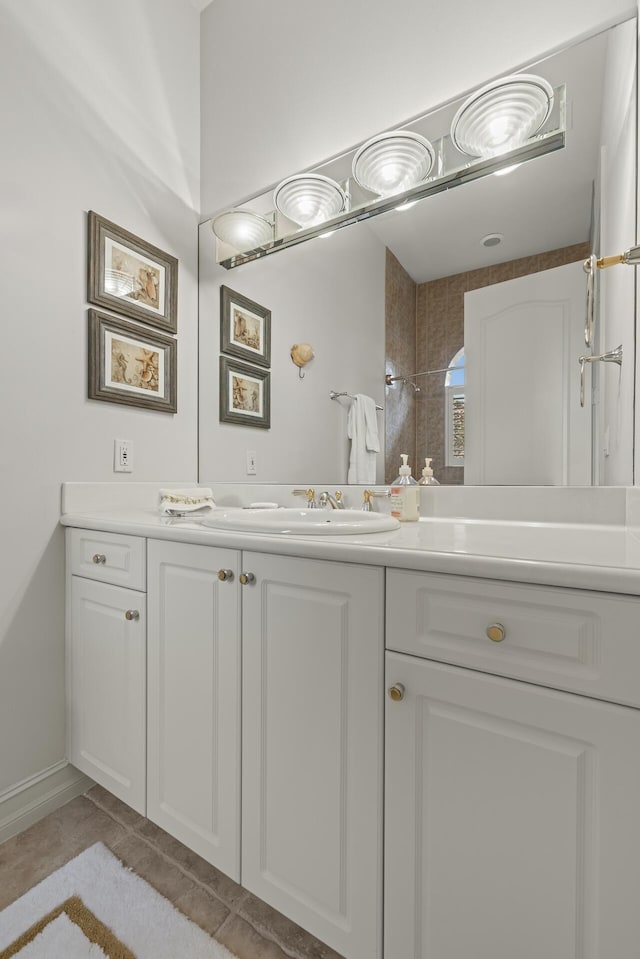 bathroom featuring vanity and tile patterned flooring