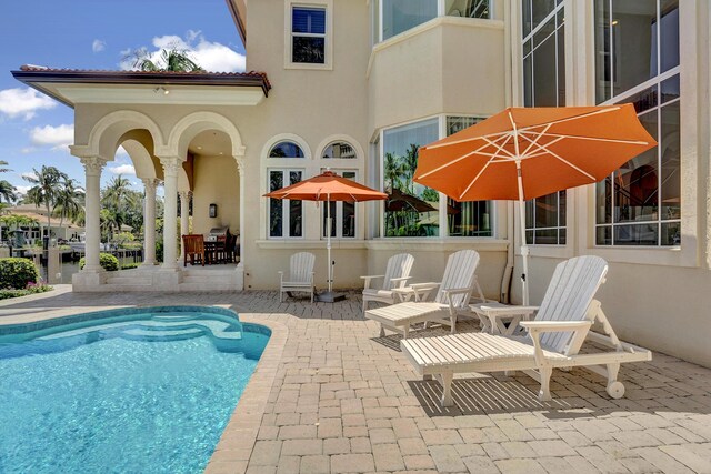 rear view of property with a patio