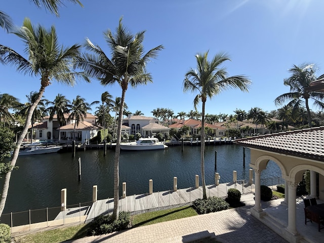 dock area with a water view