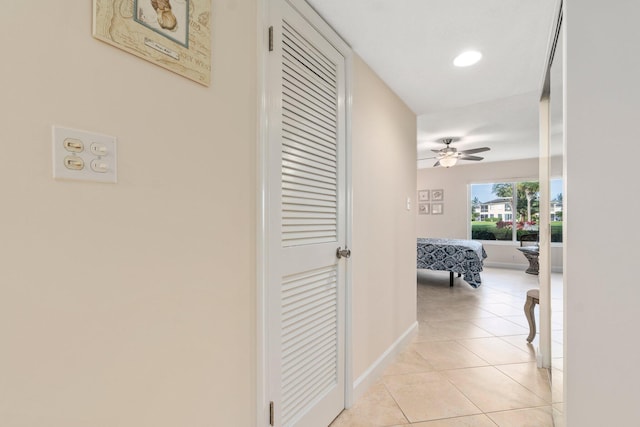 hall with light tile floors