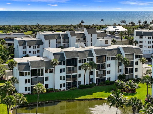 view of property with a water view