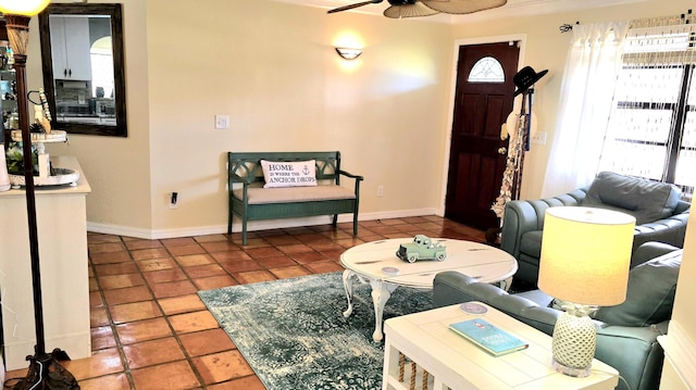 living area with tile patterned floors, ceiling fan, and plenty of natural light