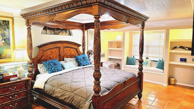 bedroom featuring crown molding, light tile patterned floors, and a textured ceiling