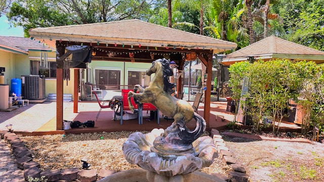 view of playground featuring a wooden deck