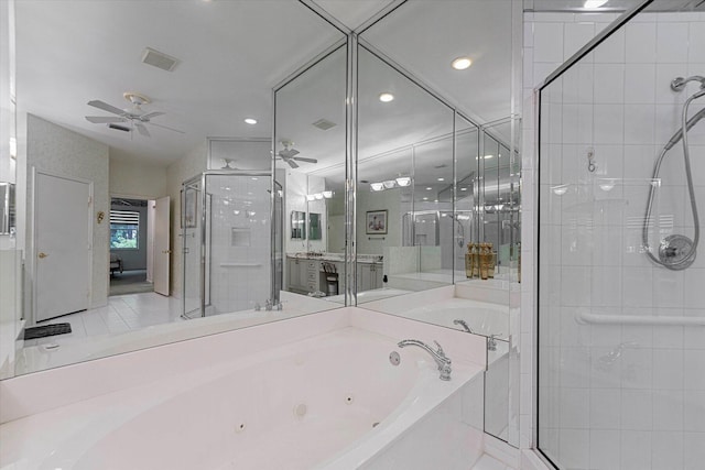 bathroom with visible vents, a jetted tub, a ceiling fan, and a stall shower