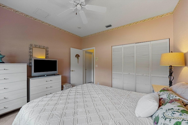 bedroom featuring a closet and ceiling fan