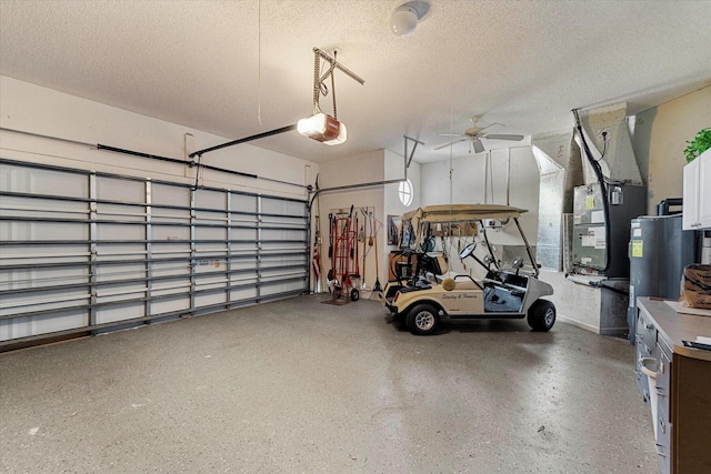 garage with a garage door opener and ceiling fan