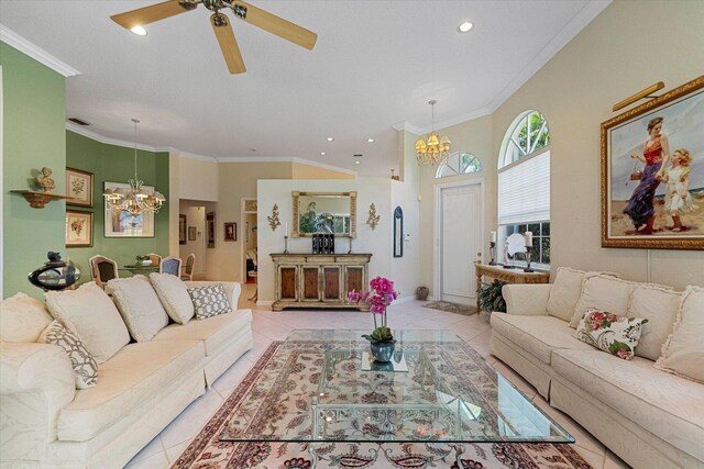 living room with ornamental molding, light tile patterned floors, and ceiling fan with notable chandelier