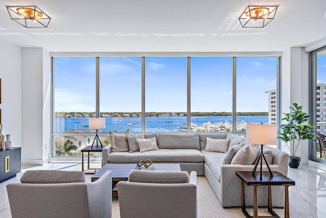 living room featuring a water view