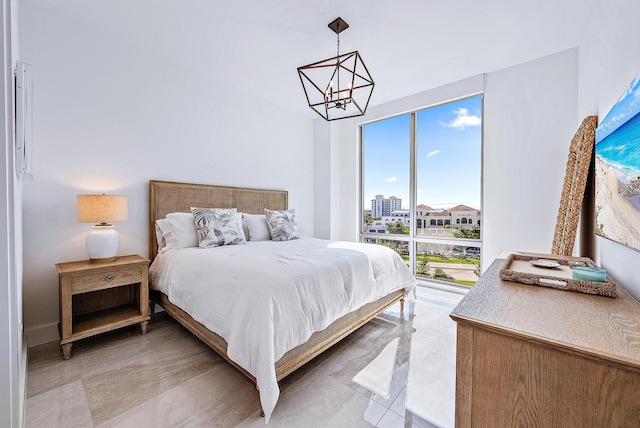 bedroom with a chandelier