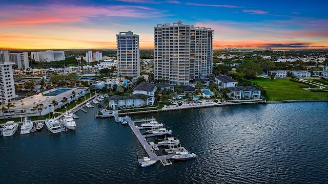 aerial view at dusk with a water view