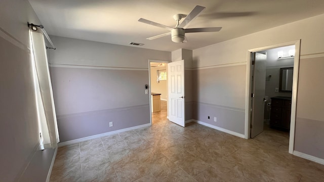 unfurnished bedroom with a closet and ceiling fan