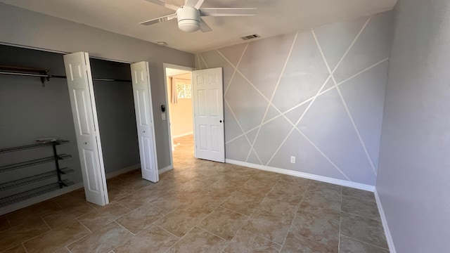 unfurnished bedroom with ceiling fan