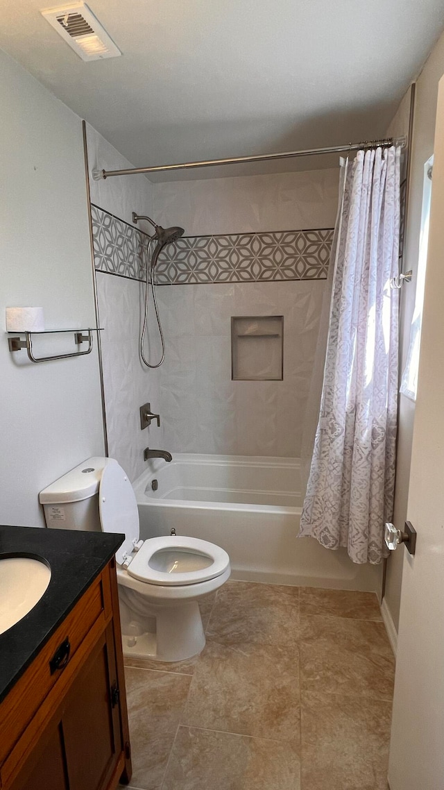 full bathroom with vanity, toilet, tile patterned floors, and shower / tub combo with curtain