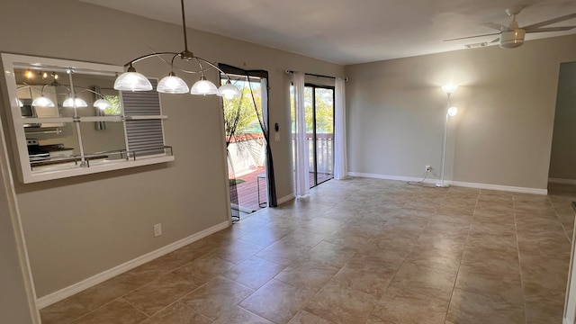 unfurnished dining area with ceiling fan