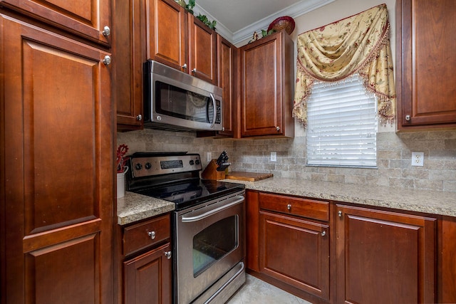 kitchen with ornamental molding, light stone counters, tasteful backsplash, and stainless steel appliances