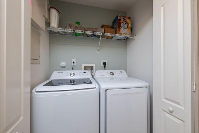 laundry area featuring independent washer and dryer, washer hookup, and hookup for an electric dryer