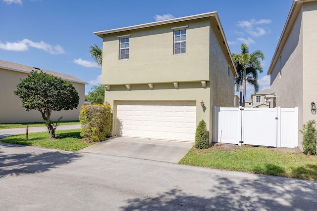 front of property featuring a garage