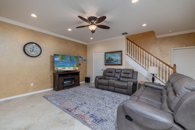 living room with ceiling fan, crown molding, and light tile flooring