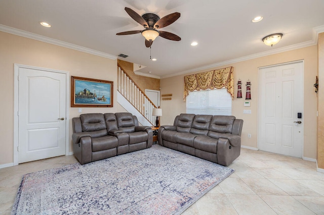 living room with ceiling fan, crown molding, and light tile floors