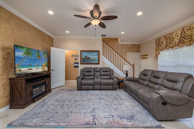 living room featuring ornamental molding, ceiling fan, and light tile flooring