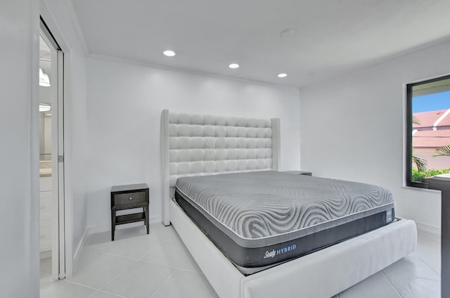 tiled bedroom with ensuite bathroom