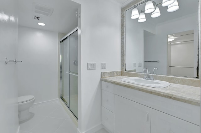 bathroom with tile flooring, vanity with extensive cabinet space, crown molding, toilet, and a shower with shower door