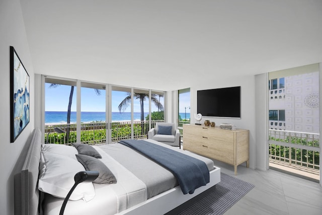 tiled bedroom featuring access to outside and floor to ceiling windows