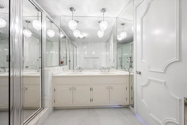 bathroom with vanity and walk in shower