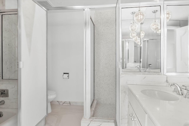 bathroom featuring vanity, walk in shower, and toilet