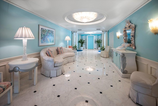 interior space with ornamental molding and ornate columns