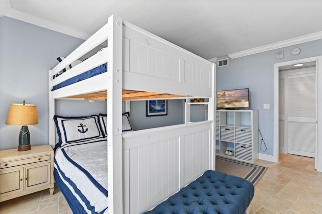 bedroom featuring ornamental molding